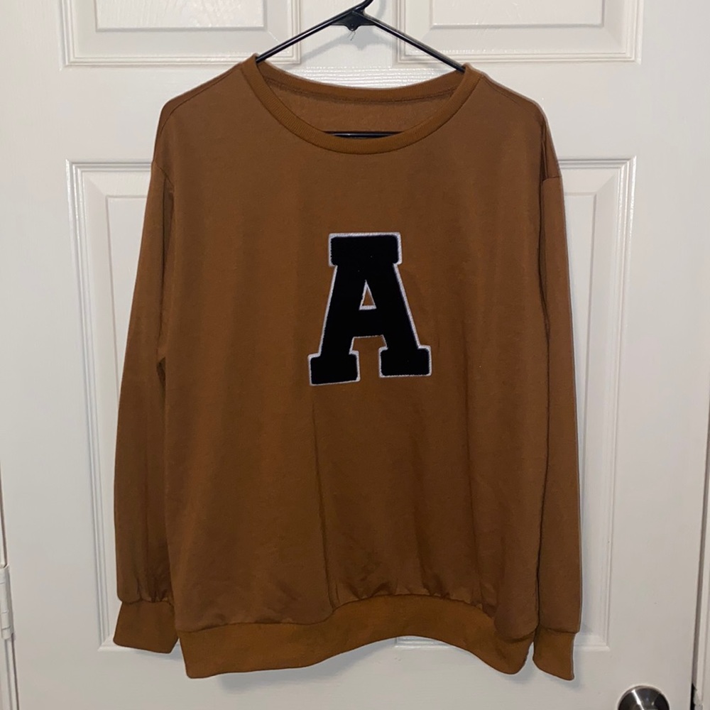 Letter “A” patched sweatshirt